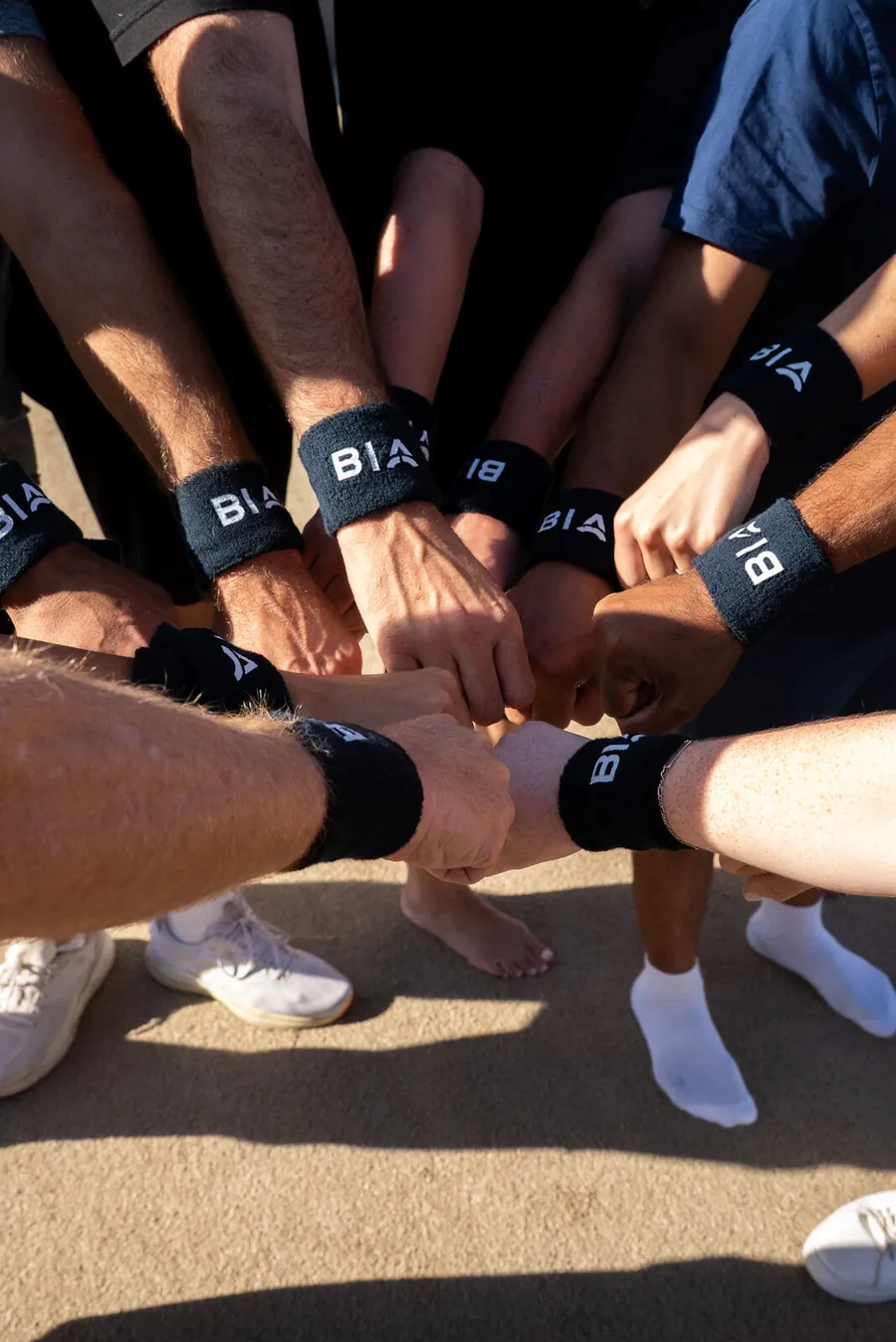 BIA members in a team huddle